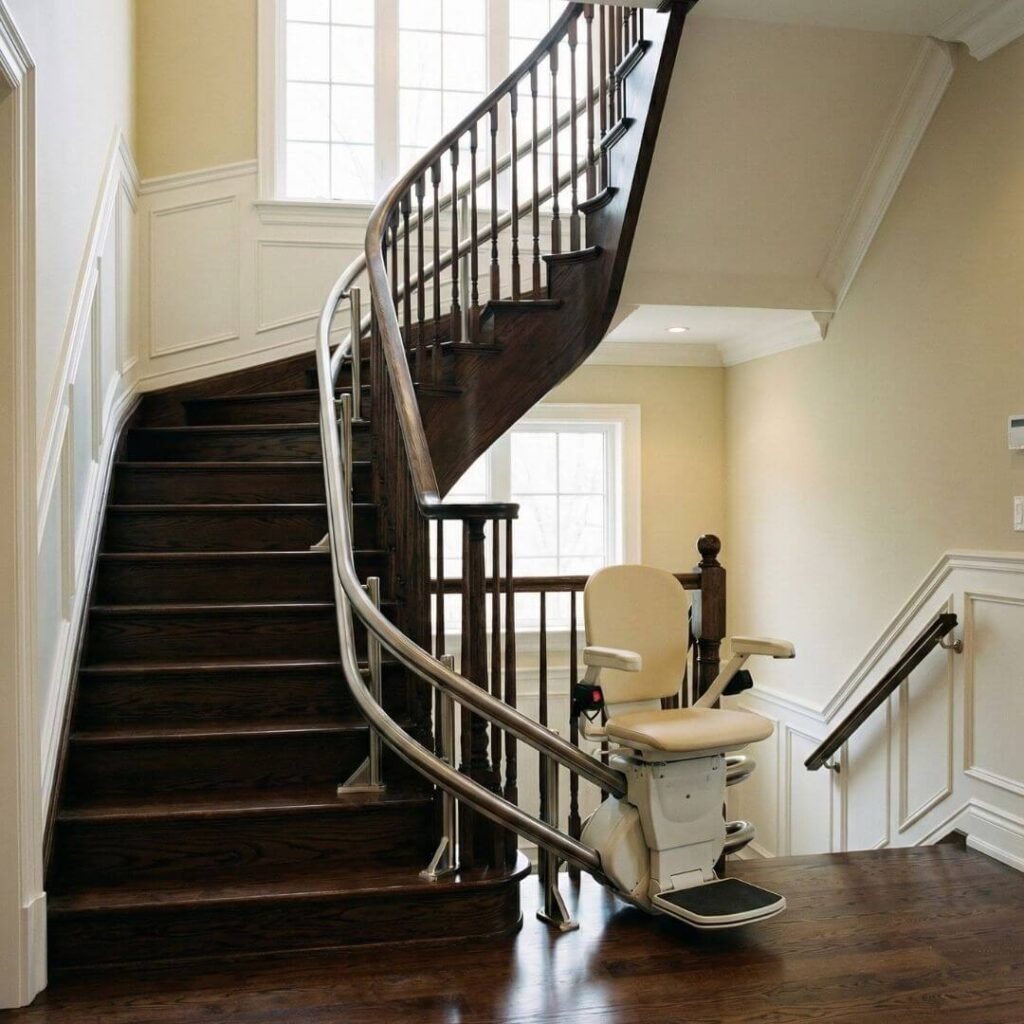 Curved stair lift custom installed on a multi-landing staircase 